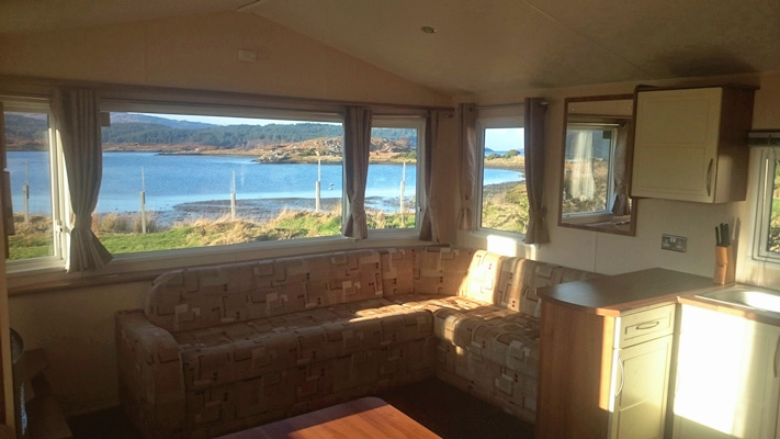 Livingroom and kitchen in Self catering caravan 2 on shore of Arivegaig Bay, Ardnamurchan Scotland