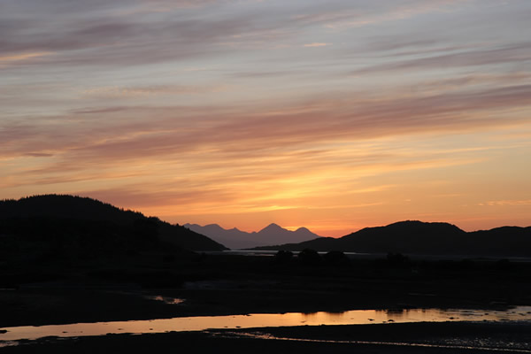 Sunset views from Self catering caravans on shore of Arivegaig Bay, Ardnamurchan Scotland